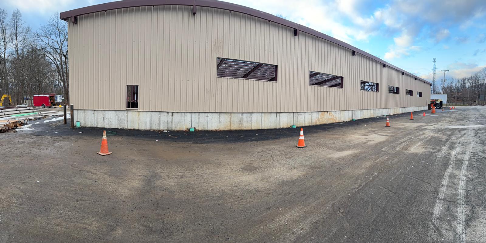 Exterior cladding installation stage of the steel building